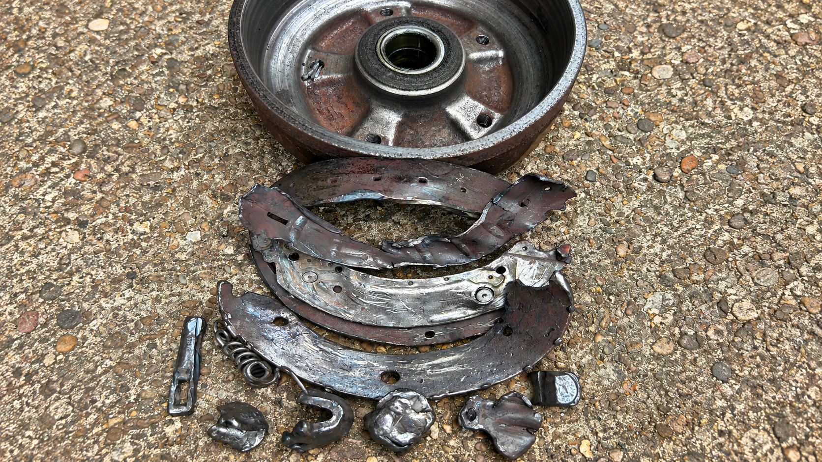 Ifor Williams trailer brakes with damaged brake drum and detached brake shoes